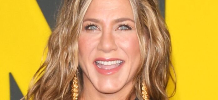Jennifer Aniston Looks 'Excited' In Perky Braless Top On NYC Streets