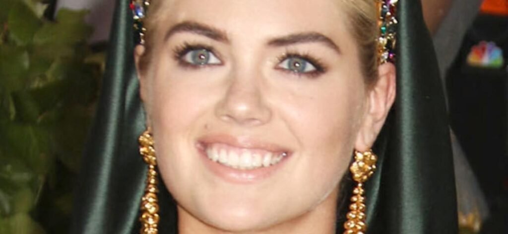 Kate Upton Nearly Falls Out Her String Bikini On The Beach