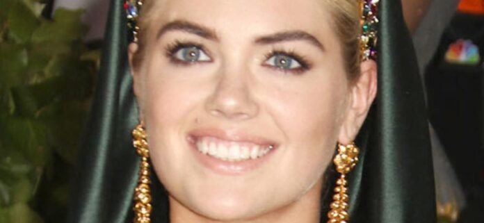 Kate Upton Nearly Falls Out Her String Bikini On The Beach