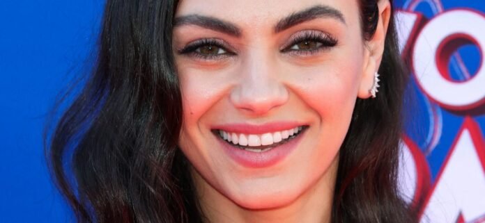Mila Kunis Shirtless In High Heels Told 'Outfit Looks Great'