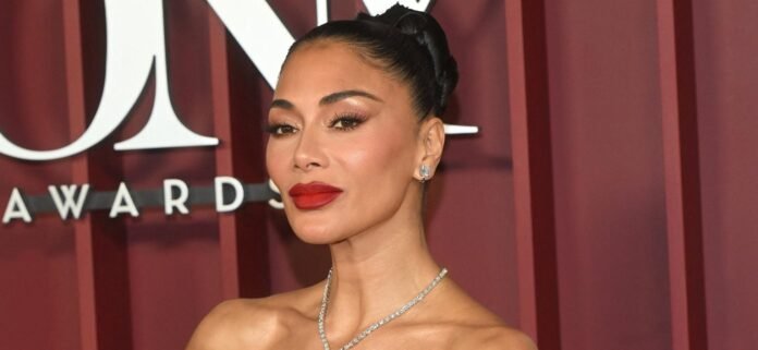 Nicole Scherzinger Sunbathing In Tiny Blue Bikini Labeled 'Plastic'