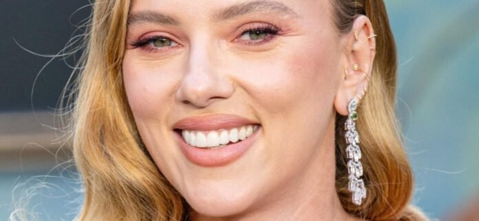Scarlett Johansson In Plunging Bikini Bullied Over 'Extra Pounds' On The Beach
