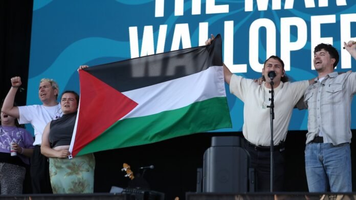 UK Festival Apologizes After The Mary Wallopers’ Set Cut Off For Displaying Palestinian Flag