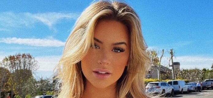 Emily Elizabeth In Oiled Up Bikini Teases 'Rum Punch All Day'