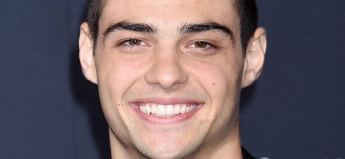 Noah Centineo Flaunts Six-Pack In Candid Behind-The-Scenes Trailer Selfie