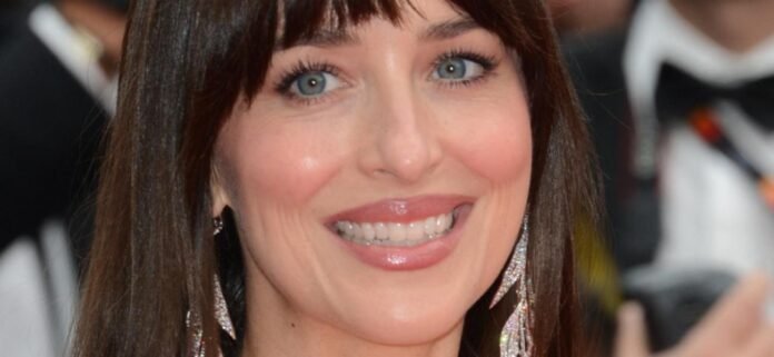 Dakota Johnson 'Has No Privacy' In Braless Minidress While Entering Car Close Up