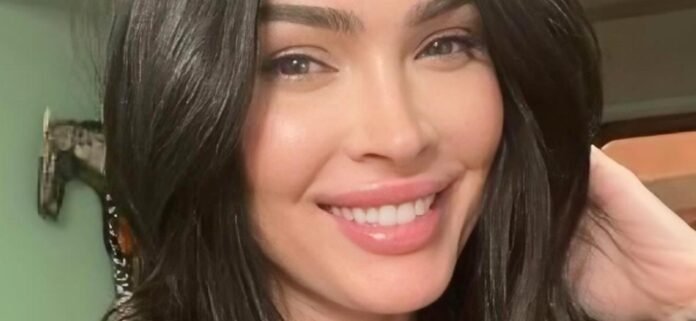 Megan-Fox-smile-1300.jpg Megan Fox In Swimsuit And Heels By A Car 'All' Curves And 'No Talent'