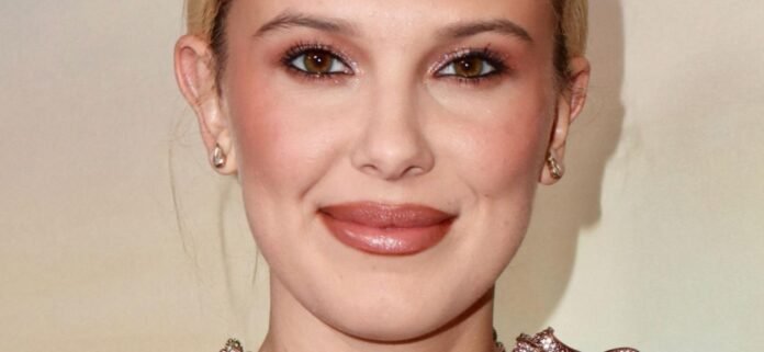 Millie Bobby Brown Outdoors In Plunging Spandex Is A '10/10'