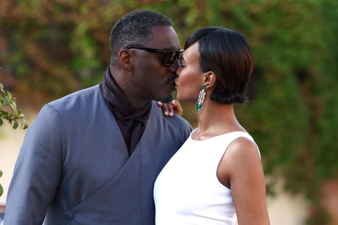 Idris Elba and Wife Sabrina Share a Kiss at Venice Film Festival