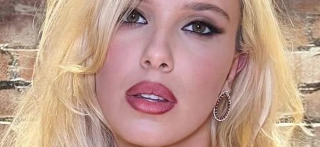 Millie Bobby Brown 'Looks 40' In Sheer Braless Dress While Blonde