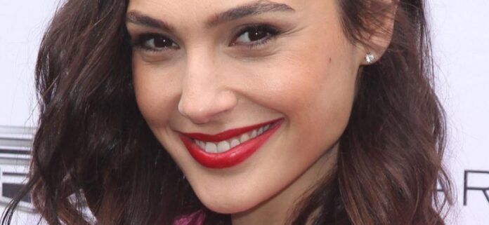Gal Gadot Is 'Breaking Hearts' In Skimpy Bikini While Windswept On A Boat