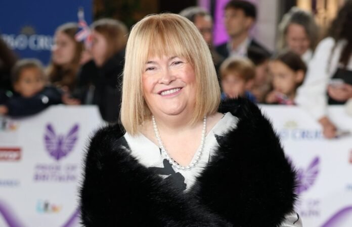 GettyImages-2242227285-1-e1761336510940.jpg Susan Boyle Then & Now: Photos of the Singer Through the Years