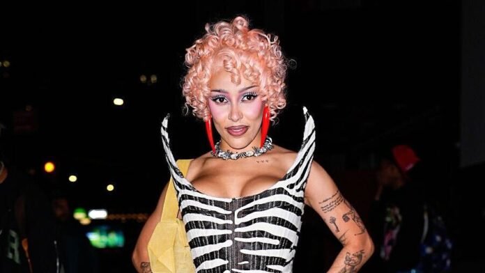 IMG_2526-1-e1761070827439.jpeg Doja Cat Then & Now: See Photos of 'Kiss Me More' Singer & Rapper