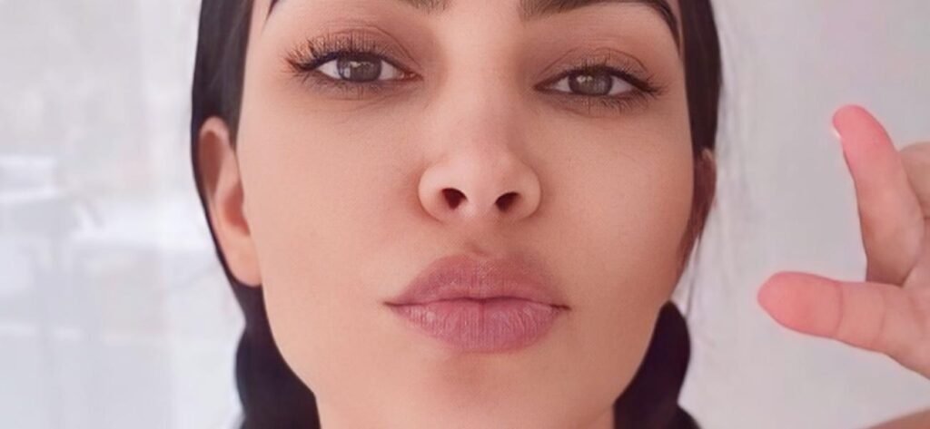 Kim Kardashian Nearly Pops Out Of Her Sheer Corset For 'Birthday Behavior'