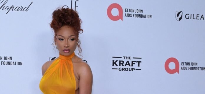 Megan-Thee-Stallion.jpg Megan Thee Stallion Is A ‘Sexy Diva’ In Tight Jumpsuit Post