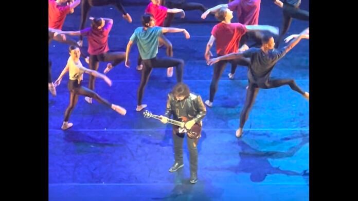 Tony-Iommi-performs-with-ballet.jpg Tony Iommi Gives Surprise Performance at Black Sabbath Ballet in London: Watch