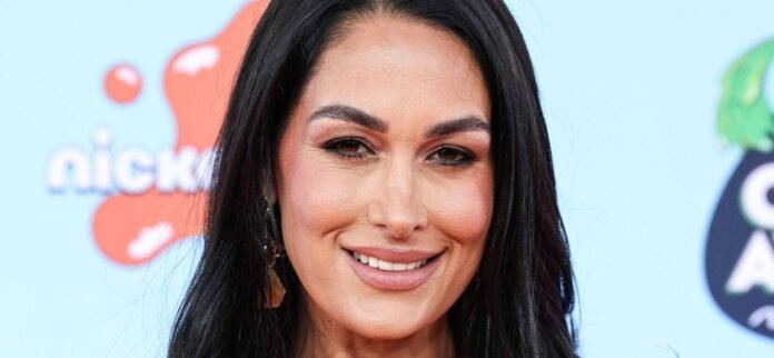 brie-bella-scaled-e1759769210711.jpg Brie Bella Serves 'Bootylicious' Tropical Goddess Vibes In Green Bikini