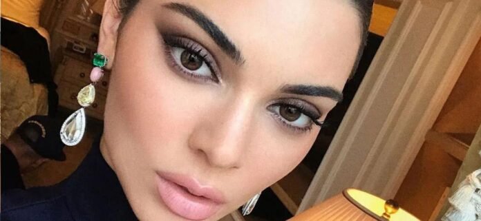 kendall-jenner-5.jpg Kendall Jenner Drips Confidence In Tiny Blue String Bikini By The Pool