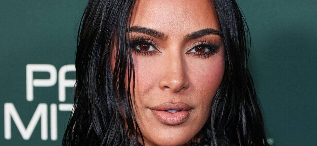 Kim Kardashian ‘Radiates’ Confidence In Tiny Bikini While Flashing Peace Signs