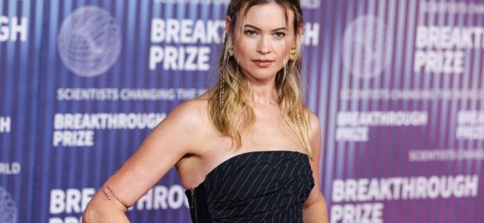 Behati-Prinsloo.jpg Behati Prinsloo Stuns In Golden Lingerie Look, Receives Marital Advice