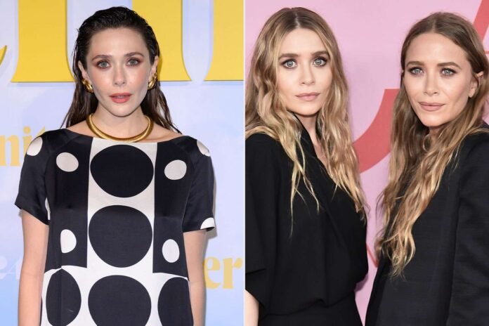 Elizabeth-Olsen-Mary-Kate-and-Ashley-112925-52d2394ba5494de7a0aa9a204c54e4aa.jpg Elizabeth Olsen Says Sisters Mary-Kate and Ashley Were 'Forced' to Support Her Career