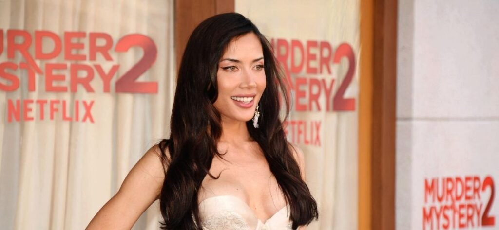 Georgina Mazzeo Poses Among Wolves In A Teeny Gingham Two-Piece