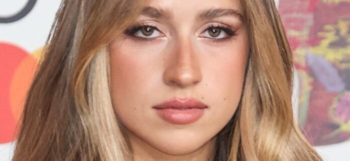 Tate-McRae-black-1300.jpg Tate McRae In Braless Street Walk Told 'Both Sides Look Great'