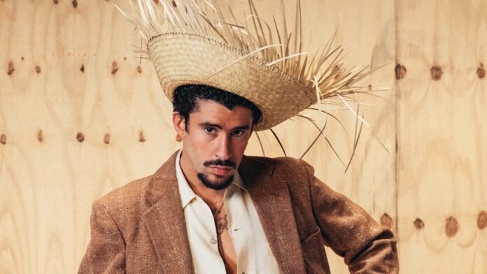 bad-Bunny-Photo-Credit-Eric-Rojas_eb022a.jpg Bad Bunny Takes Swipe at ICE: “There Are Many Ways to Defend Where You’re From. We Chose Music”