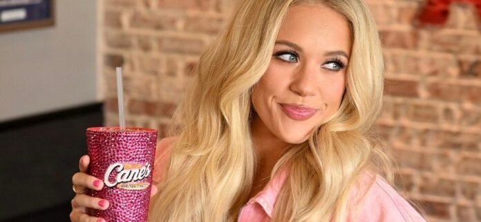 megan-moroney-raising-canes-e1763230669265.jpg Megan Moroney’s ‘Cloud 9’ Era Officially Takes Flight With A Dreamy Pop-Up At Raising Cane’s