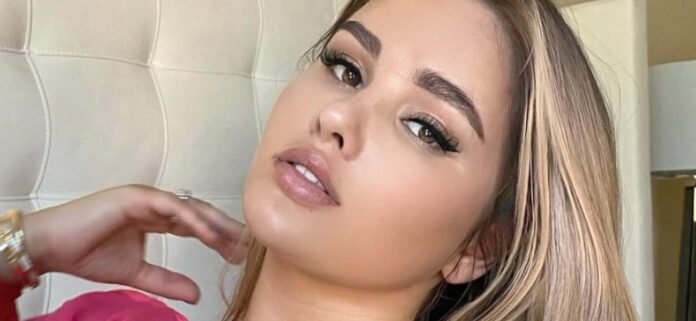 Anastasiya Kvitko Highlights Her 'Big Toys' In Unbuttoned Minidress