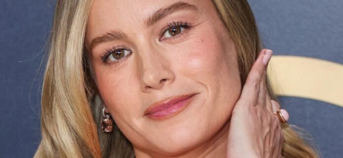 Brie Larson Highlights Her 'Full Moons' In Plunging Braless Dress