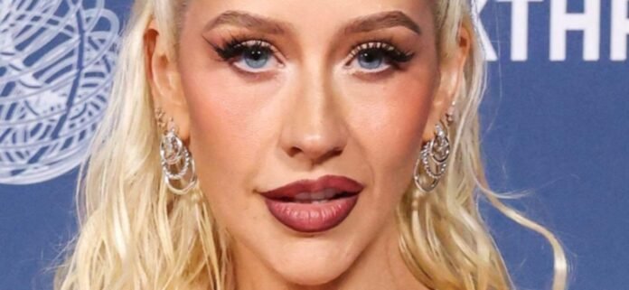 Christina Aguilera Highlights 'Ozempic' Thigh Gap In See-Through Minidress
