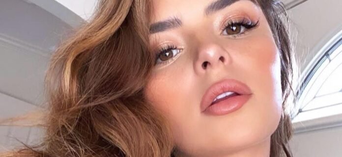 Demi Rose Highlights 'Huge Melons' In Unbuttoned Jacket While Shirtless