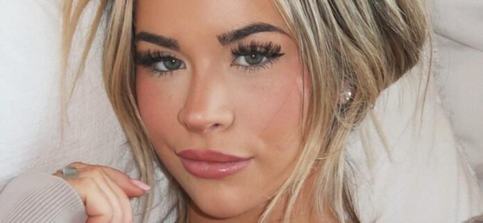 Emily Elizabeth Popping Out Of Her Multicolor Bikini Highlights Her 'Massive Melons'