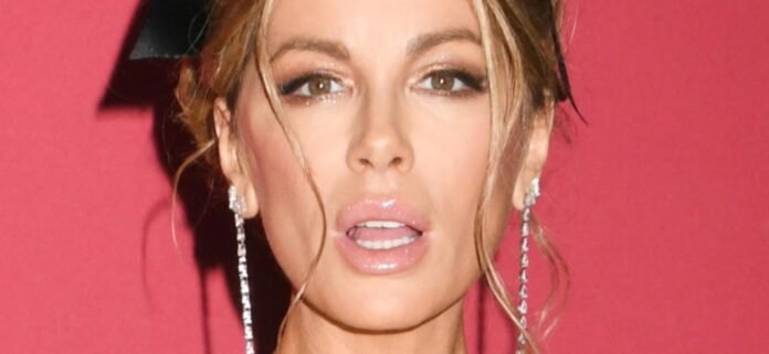 Kate Beckinsale A 'Skeleton' While Stretching In Skimpy Bikini And Boots