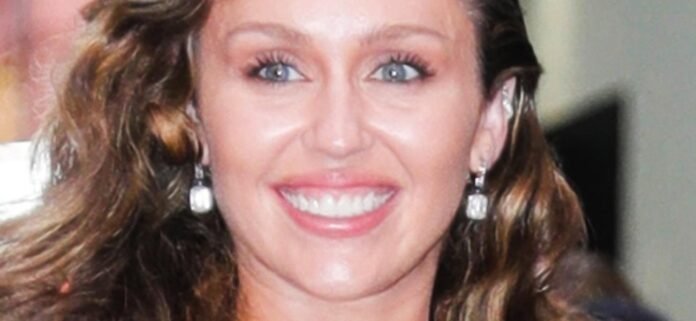 Miley-Cyrus-wash-1300.jpg Miley Cyrus Highlights 'Lovely Rack' In Sheer Braless Top While Grabbing Groceries