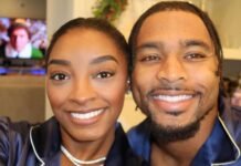 Simone Biles and Jonathan Owens Sport Matching Pajamas Whereas Unwrapping Items Simone Biles and Jonathan Owens Sport Matching Pajamas While Unwrapping Gifts