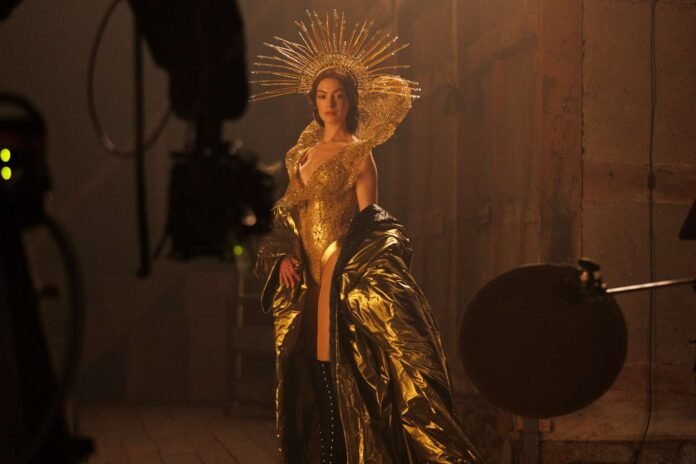 anne-hathaway-mother-mary-120125-c1a71cb943854ffb9f97c90b914007c4.jpg Anne Hathaway Channels Her Inner Pop Star in 'Mother Mary' Trailer