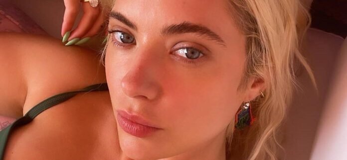 Ashley Benson 'Still Looks 21' As She Lounges Poolside In A Bright Green Bikini