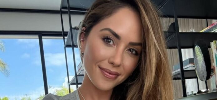 brittney-palmer.jpg Brittney Palmer Laying On Bed In Lingerie Told To 'Cover It Up'