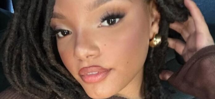 Halle Bailey Brings Coastal Goddess Energy In Stunning Oceanfront Bikini Photo
