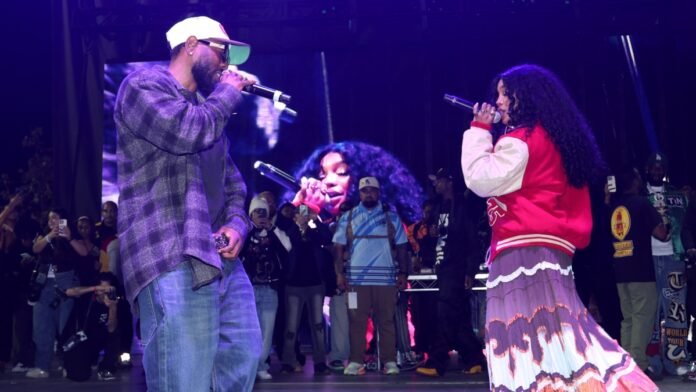 Kendrick Lamar Joins SZA for Surprise Reunion at TDE Christmas Concert: Watch