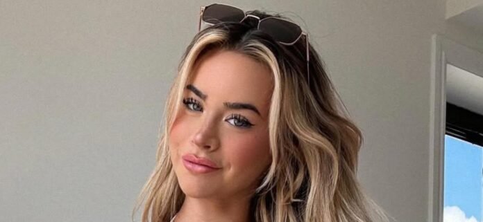 Emily Elizabeth In Yellow Bikini Sucks A Lollipop In Hawaii