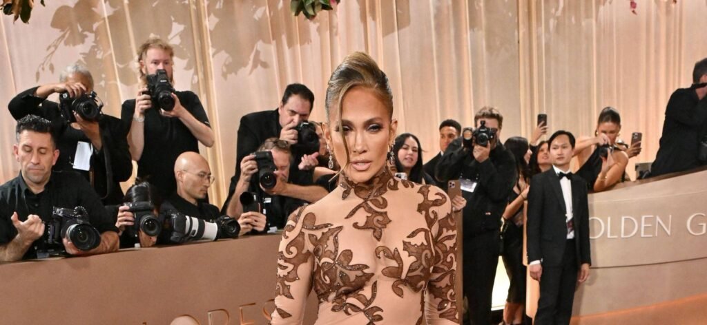 Jennifer Lopez Slays In Sheer Curve-Hugging Dress, Crowned ‘Best Dressed’