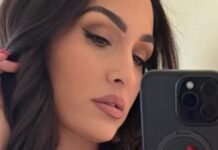 Nikki Bella Exhibits Off Her 'Twins' In Scorching Pink Bikini Nikki Bella Shows Off Her 'Twins' In Hot Pink Bikini