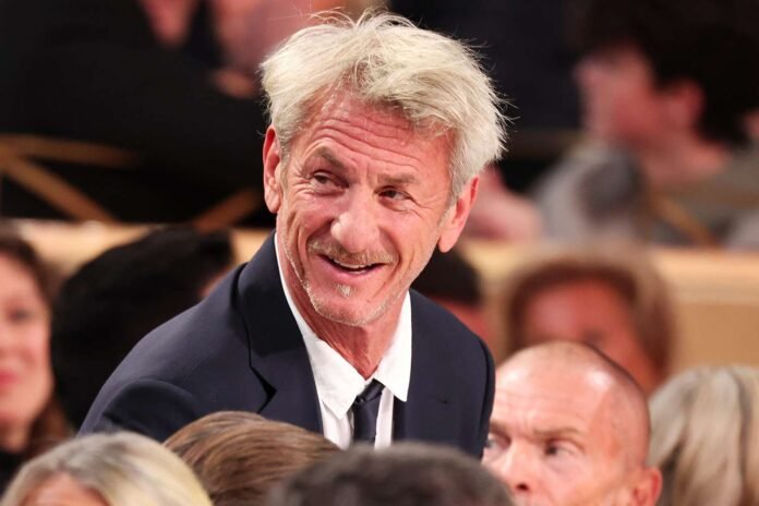 Sean Penn Spotted Smoking at His Table During Golden Globes 2026